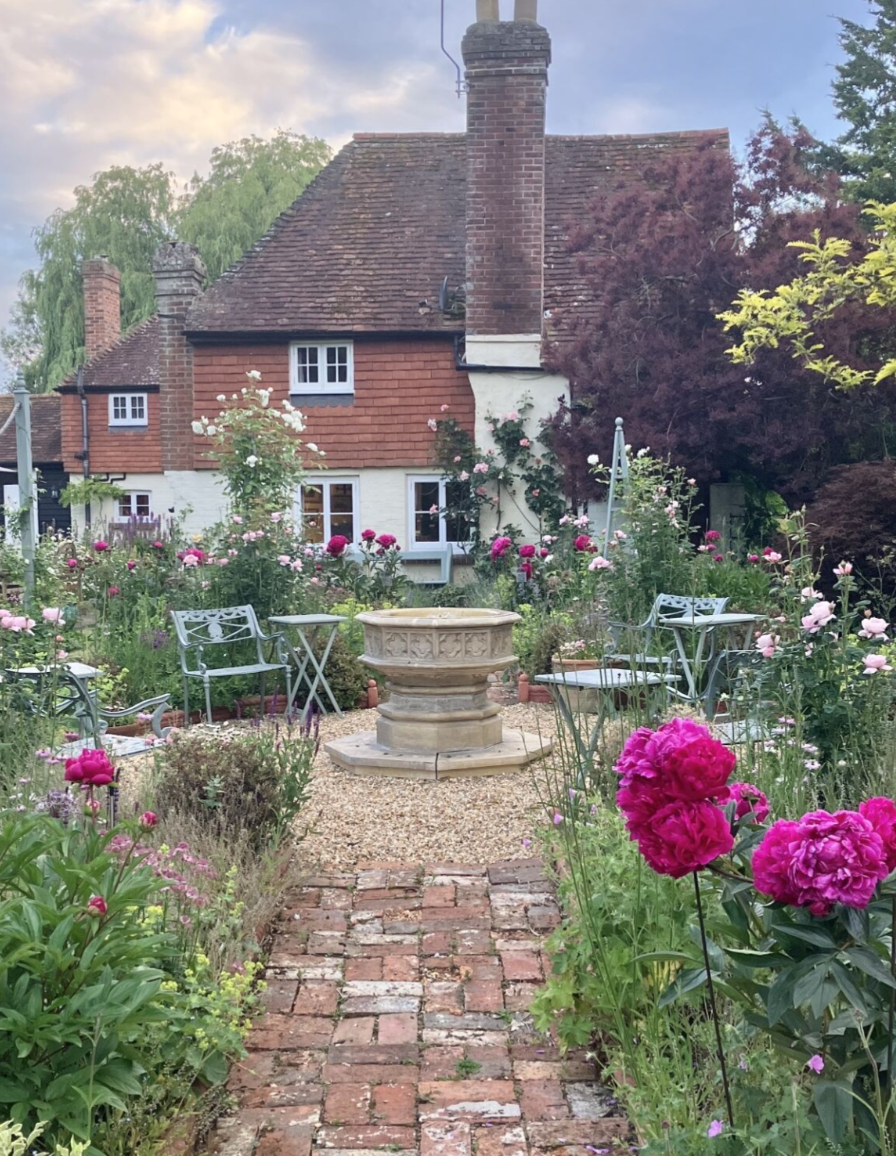 Romantic bridal bouquet featuring garden roses and seasonal flowers - Sussex wedding florist